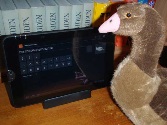 Happy goose using, and admiring, the Truth Table Application on a Honeycomb tablet